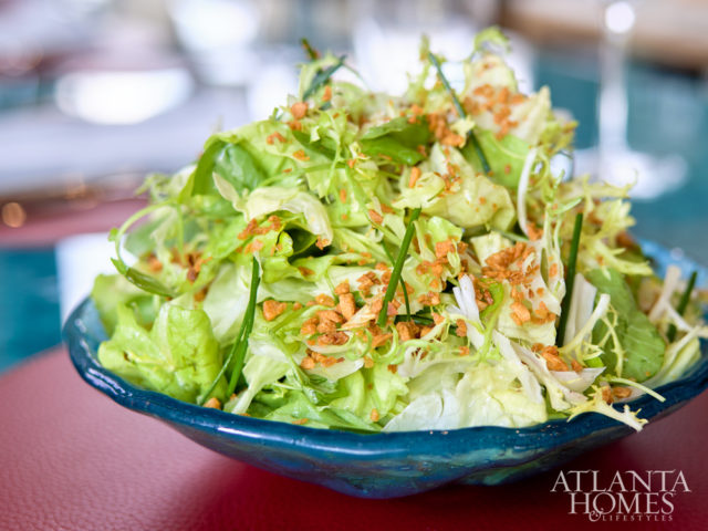 Garden greens salad with chives and garlic crumbs.