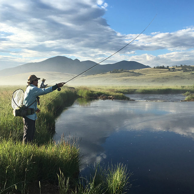 A fisherman enjoys miles of private water along the Tarryall River.