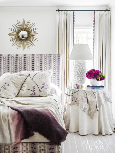 Layers of soft, tactile textures in the guest bedroom impart a peaceful ambiance. The custom headboard features Scalamandré’s Nebula fabric.