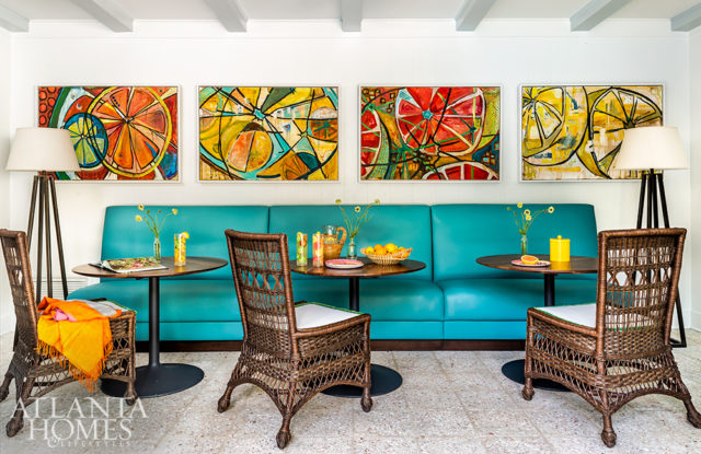 The citrus paintings inspired the color palette for the house while the original tabby floors provide texture to the space.