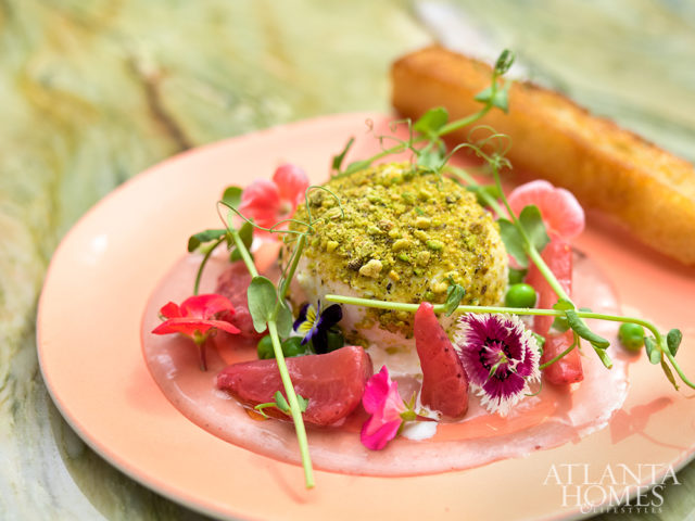 Burrata with strawberries and pistachios.