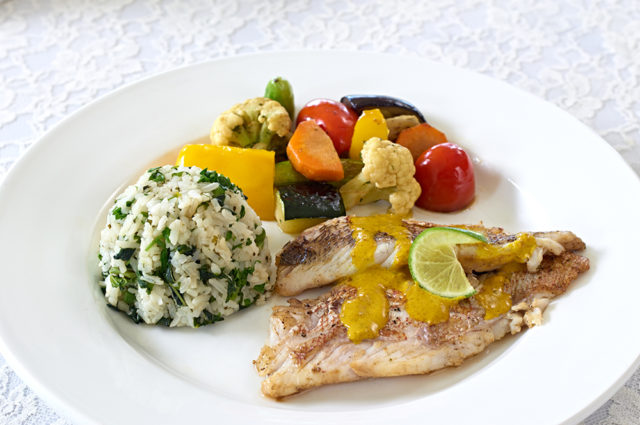 Flavor-packed Jamaican cuisine is prepared daily by on-site chefs.