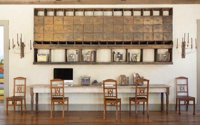A 20-foot-long farm table creates the ultimate work-from-home space.
