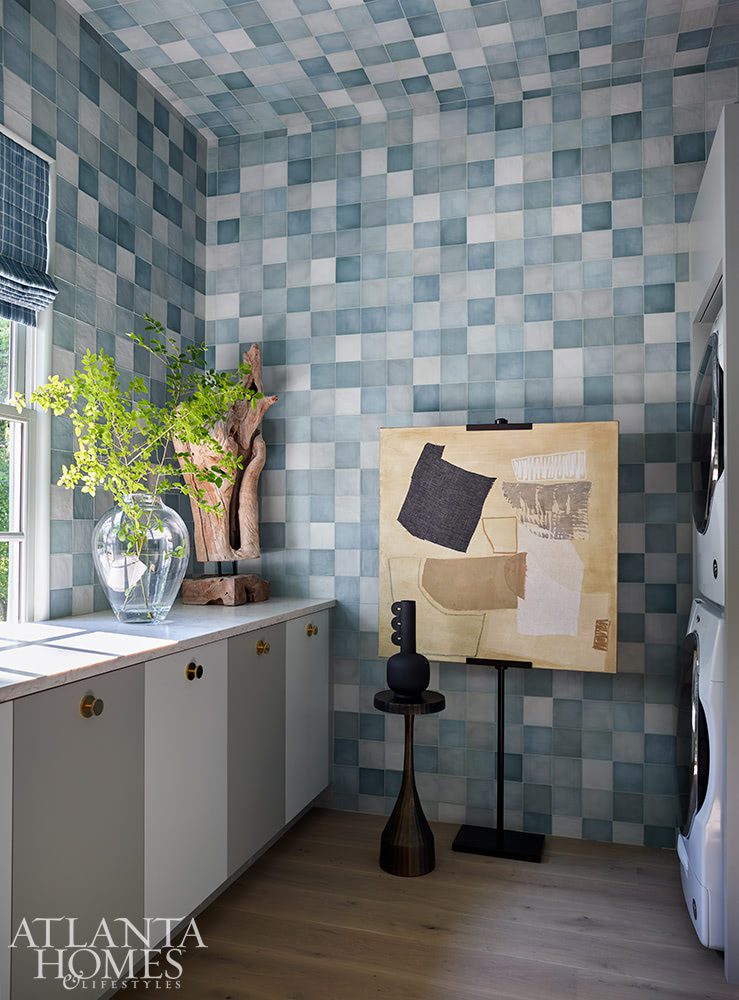 teal ceramic tile laundry room