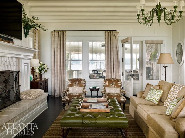 leaving room with beamed ceiling
