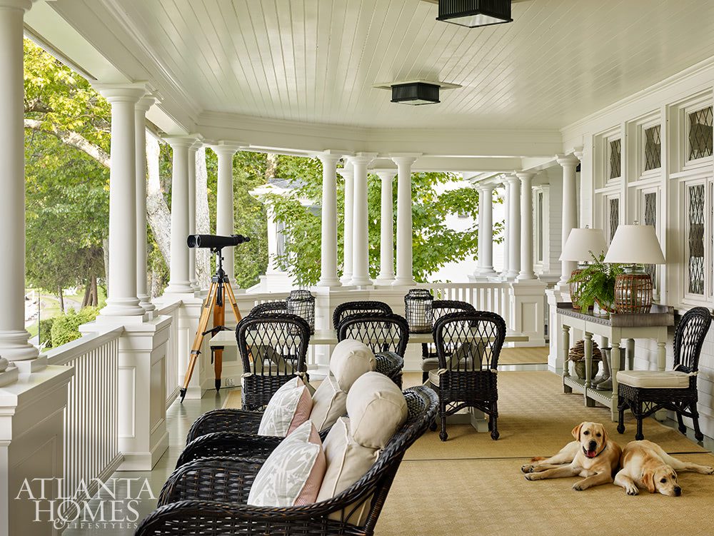 wicker furniture on a large porch