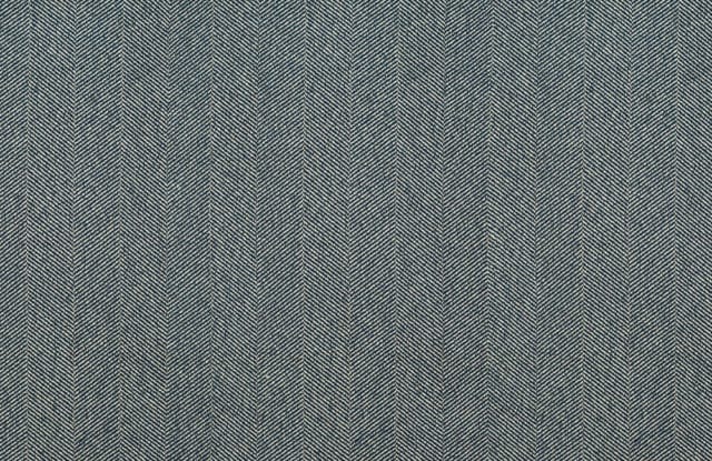 Close-up of dark blue and white herringbone fabric texture