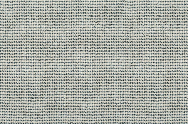 Close-up of woven fabric with thin indigo stripes on a cream background.