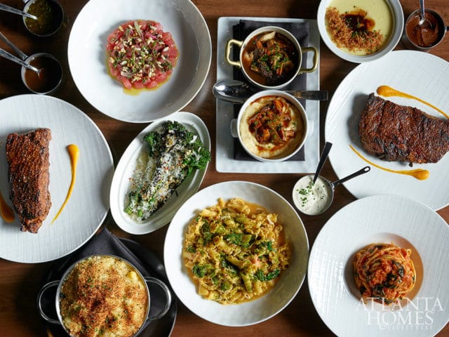 Assortment of gourmet dishes including steak, pasta, and mac and cheese.